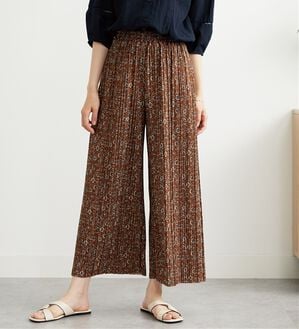 BELLUNA（ベルーナ）の「なめらか素材ゆったりプリーツパンツ（ワイドパンツ・ガウチョ）」｜オレンジ系花柄