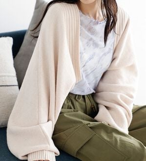 GeeRA（ジーラ）の「ふんわり柔らかニットボレロカーディガン（ニットカーディガン）」｜アイボリー