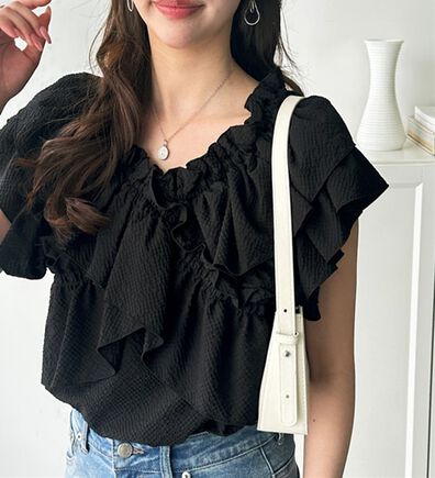 GeeRA（ジーラ）の「クロスフリルサッカーブラウス（ブラウス）」