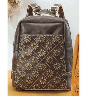 ルフラン（ルフラン）の「ズッケロ　花柄カットワークリュック（リュック）」｜チョコ
