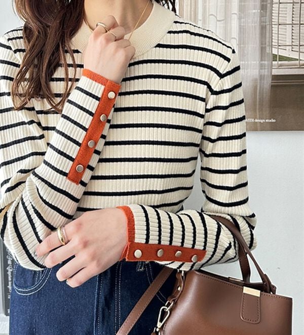 GeeRA（ジーラ）の「袖口ボタン配色ハイネックリブニット（ニット・セーター）」｜詳細画像