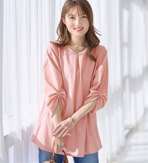 alotta（アロッタ）の「＜６つの機能付＞７分袖Ａラインフレアチュニックブラウス（チュニック）」｜ピンク