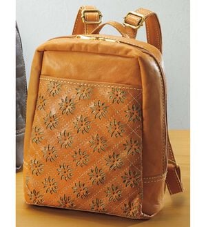 ルフラン（ルフラン）の「ズッケロ　花柄カットワークリュック（リュック）」｜ブラウン