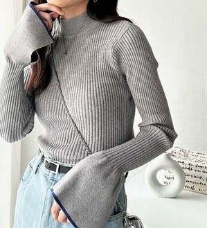 GeeRA（ジーラ）の「配色フレアリブニットトップス（ニット・セーター）」｜グレー