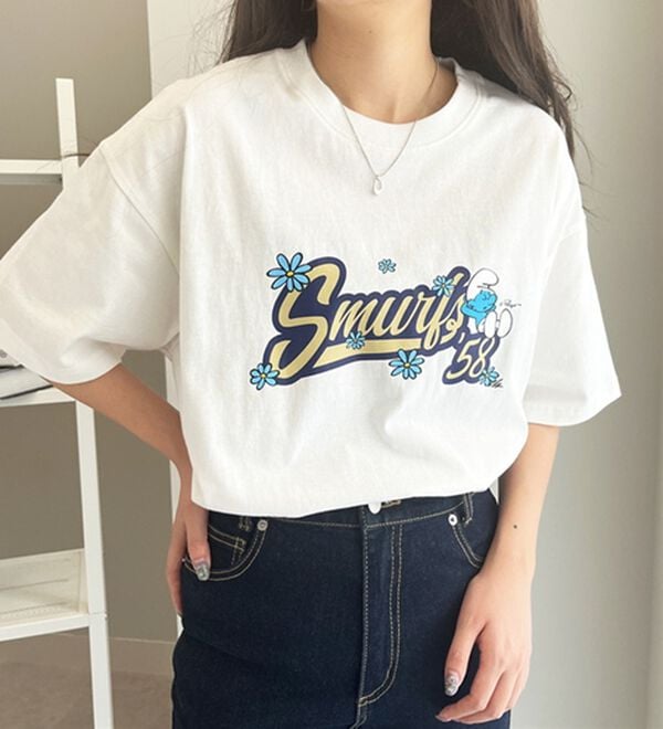 GeeRA（ジーラ）の「【スマーフ】コラボプリントＴシャツ（カットソー）」｜ロゴプリント白