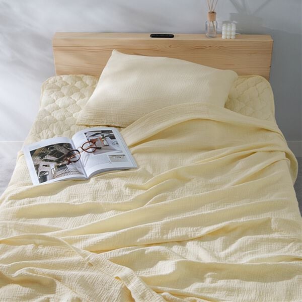 iellio（イエリオ）の「綿１００％水洗い二重ガーゼ寝具シリーズ＜ダブルガーゼ・ふんわりガーゼ敷パッド・枕カバー・ガーゼケット＞（敷パッド）」｜アイボリー