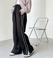 GeeRA（ジーラ）の「裾スリットサイドラインナイロン混パンツ（ワイドパンツ・ガウチョ）」