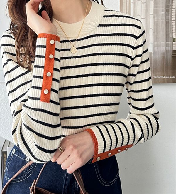 GeeRA（ジーラ）の「袖口ボタン配色ハイネックリブニット（ニット・セーター）」｜詳細画像