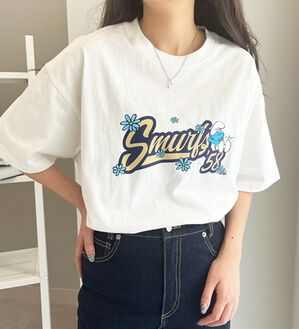GeeRA（ジーラ）の「【スマーフ】コラボプリントＴシャツ（カットソー）」｜ロゴプリント白