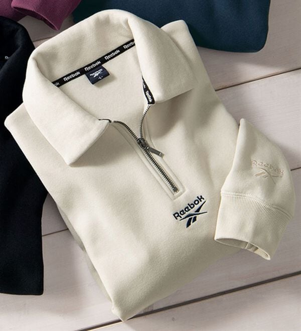 「＜リーボック＞ジップアップデザイントレーナー（メンズトレーナー）」｜オフホワイト