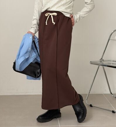 GeeRA（ジーラ）の「すっきり見え！フロントラインスウェットナロースカート（ロングスカート）」