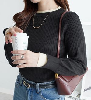 Viola e Viola（ヴィオラ エ ヴィオラ）の「レイヤード風リブニット（ニット・セーター）」｜ブラック